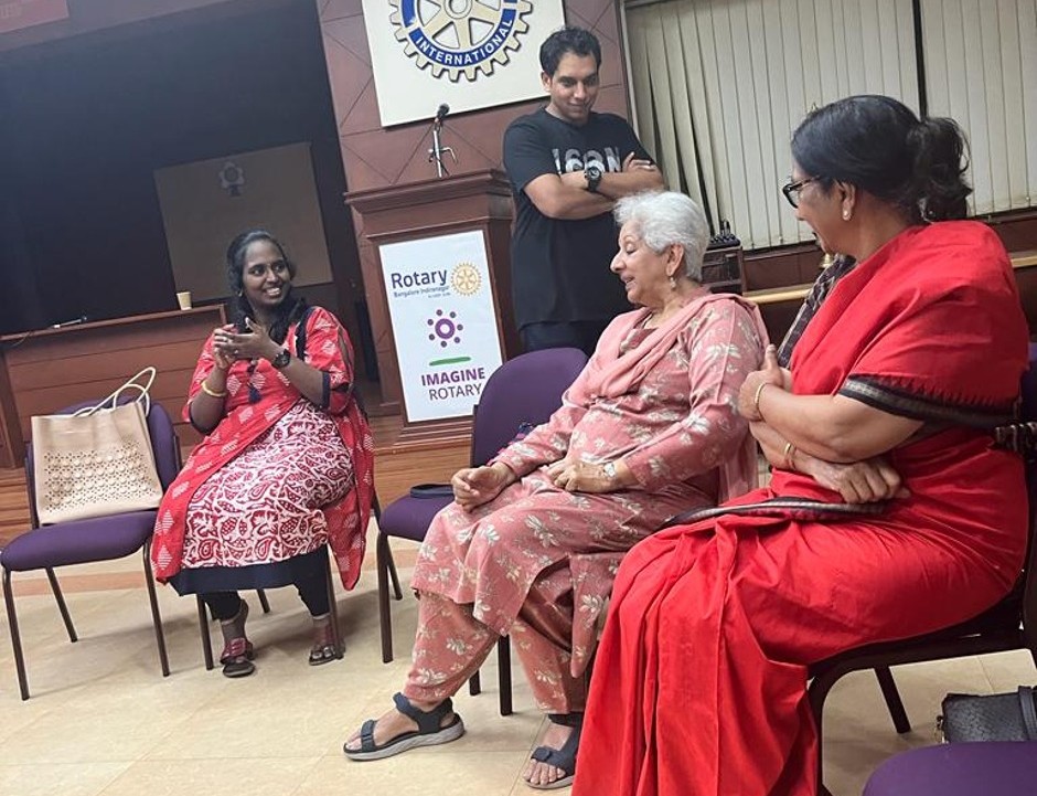 Akhila participating in a professional panel